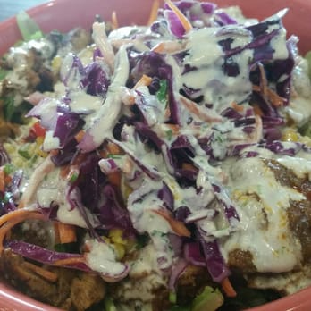 Mezeh - Salad bowl with chicken and veggie toppings and hummus and Mezeh tahini sauce - Mediterranean Near Me - Arlington, Virginia Mezeh - Salad bowl with chicken and veggie toppings and hummus and Mezeh tahini sauce - Mediterranean Near Me - Arlington, Virginia