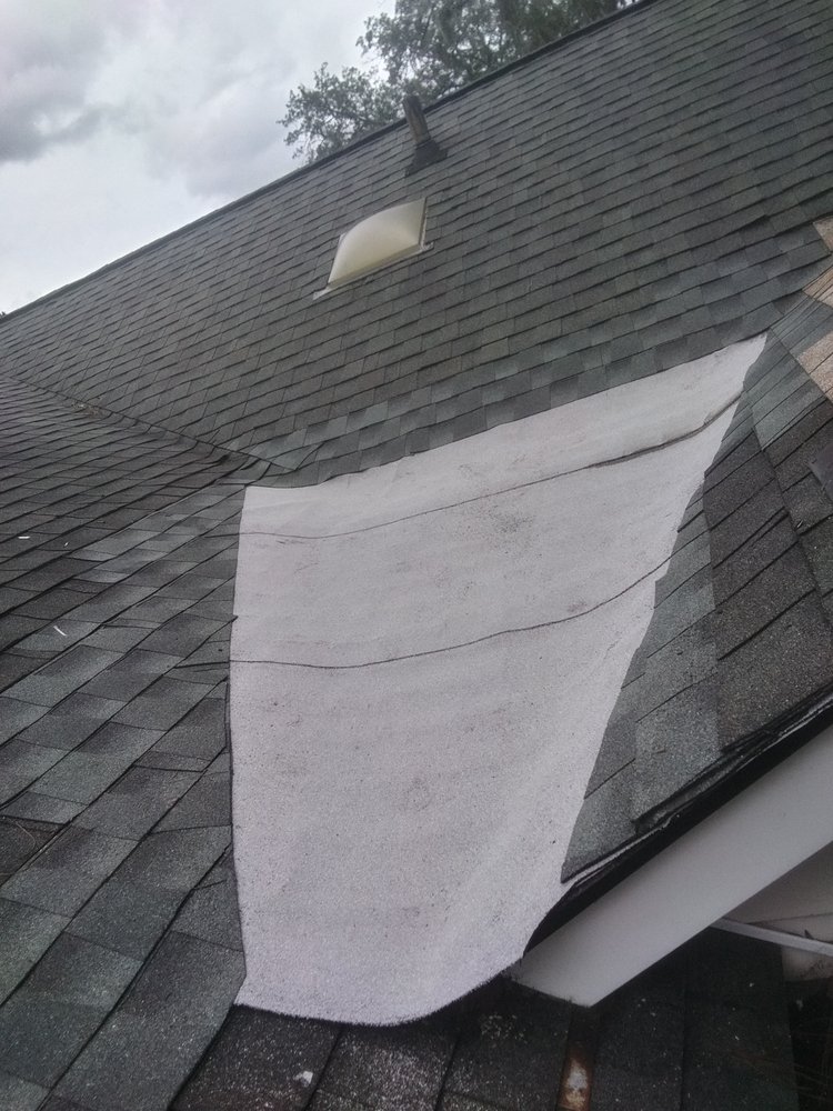 Slide of Roy's Roof Repair