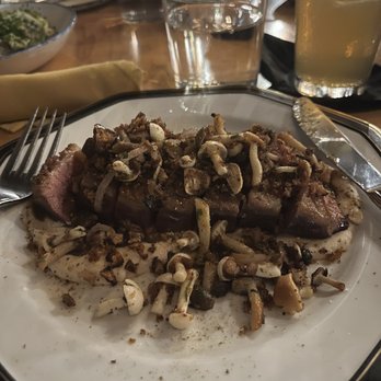 Nancy's Hustle - Duck breast over cauliflower purée and mushrooms - New American Near Me - Houston, Texas
