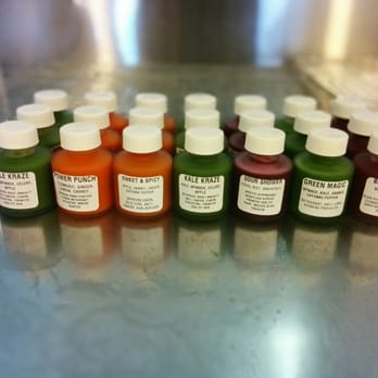 Refuel Juicery - a variety of bottles on a counter - Juice Bars & Smoothies Near Me - Toronto, Ontario