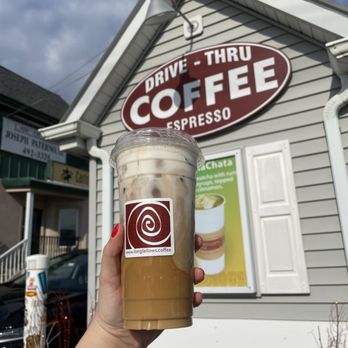 Longfellow's Coffee - a hand holding a cup of coffee - Coffee & Tea Near Me - Kinnelon, New Jersey