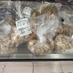 Bags of delicious chicharrones. All made in house.