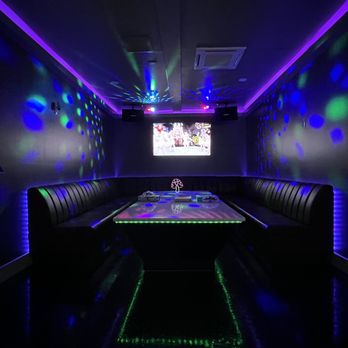Singing Karaoke Club - a neon lit booth - Karaoke Near Me - New York, New York Singing Karaoke Club - a neon lit booth - Karaoke Near Me - New York, New York
