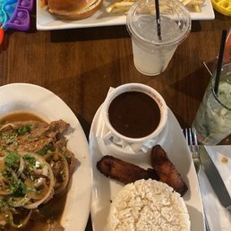 Palomilla steak with rice and black beans  , from the kid's menu cheeseburger with fries.