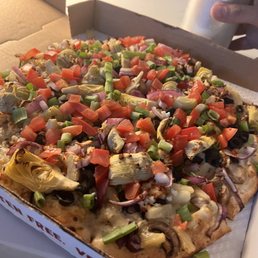 Medium sized Reggie Garlic Veggie Pizza, add pineapple, non-dairy cheese plus feta