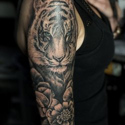 Sacred Grounds Tattoo Studio