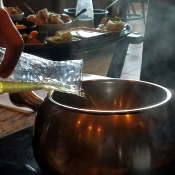 The Melting Pot - Making the Caribbean fondue - Fondue Near Me - Albuquerque, New Mexico The Melting Pot - Making the Caribbean fondue - Fondue Near Me - Albuquerque, New Mexico