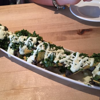 Vinaigrette - Black Bean Kale Nachos with avocado cilantro dressing... Oh, my! (seasonal) - Salad Near Me - Albuquerque, New Mexico Vinaigrette - Black Bean Kale Nachos with avocado cilantro dressing... Oh, my! (seasonal) - Salad Near Me - Albuquerque, New Mexico