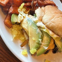 Nashville chicken sandwich with sweet potatoes. Nashville chicken sandwich with sweet potatoes.
