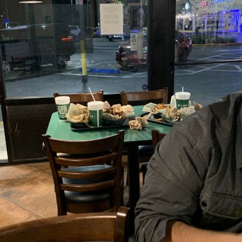 Wingstop - Dirty table, that was not picked up for at least 20 minutes - Chicken Wings Near Me - Tampa, Florida