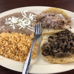 2 taco plate with 1 carne asada and 1 carnitas taco, $6.59