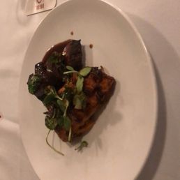 Wagyu steak, sweet potato gratin, brussel sprout pedals Wagyu steak, sweet potato gratin, brussel sprout pedals