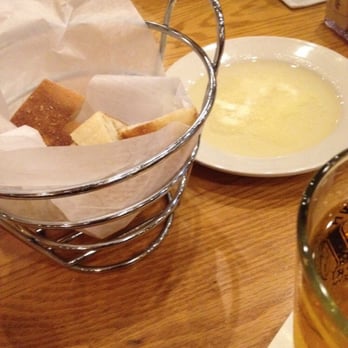 Stoneforge Grill - Bread basket with olive oil. - American Near Me - South Easton, Massachusetts Stoneforge Grill - Bread basket with olive oil. - American Near Me - South Easton, Massachusetts