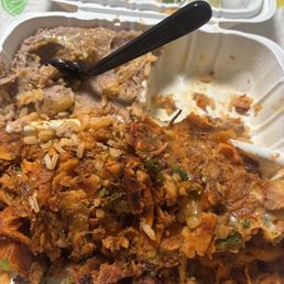 this is supposed to be birria tacos all cheese tortilla onion absolutely disgusting. the rice was good tho .