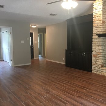 Bryco Services - Living room remodel - including new flooring, custom entertainment center, lighting, and painting. - Handyman Near Me - Cedar Park, Texas Bryco Services - Living room remodel - including new flooring, custom entertainment center, lighting, and painting. - Handyman Near Me - Cedar Park, Texas