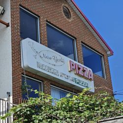 New York Pizza - The building sign of this restaurant.