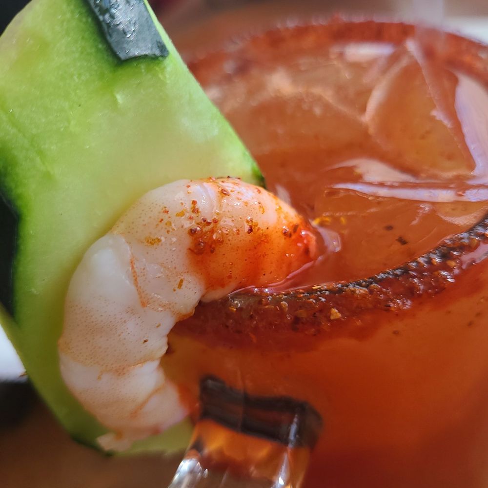 El Malecon Mariscos Estilo Sinaloa - a shrimp cocktail garnished with a cucumber - Seafood Near Me - Long Beach, California El Malecon Mariscos Estilo Sinaloa - a shrimp cocktail garnished with a cucumber - Seafood Near Me - Long Beach, California