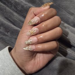 Gold nails with 3d design and gems