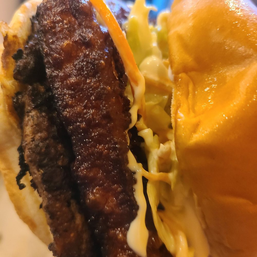 PINCHO - Up close of the Fritanga Burger! - big and filling - Burgers Near Me - Miami, Florida PINCHO - Up close of the Fritanga Burger! - big and filling - Burgers Near Me - Miami, Florida