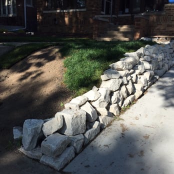 Rescue My Landscape - a stone wall in front of a house - Landscaping Near Me Rescue My Landscape - a stone wall in front of a house - Landscaping Near Me
