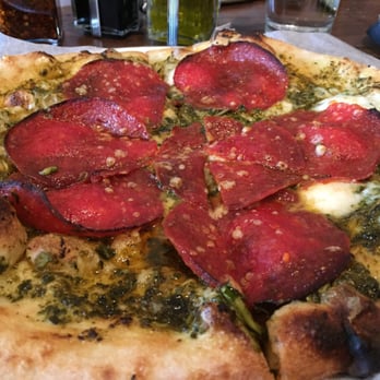 Fired Up Pizzeria - Pesto with pepperoni. (Tasty, but a VERY greasy/oily bottom) - Pizza Near Me - Durango, Colorado