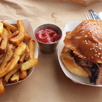 Garden District - Brisket sandwich and fries.  The sandwich looks awesome but was "good". - Barbeque Near Me - Washington, DC, District of Columbia