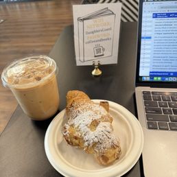 Almond croissant, Iced Alice Rabbit latte Almond croissant, Iced Alice Rabbit latte