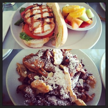 Emle's Restaurant - Garlic chicken sandwich with fruit (top), French toast half (bottom) - American Near Me - Northridge, California