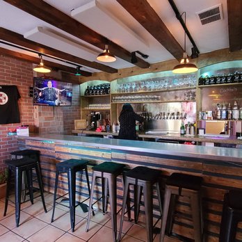 Chili Line Brewing - a bar with bar stools - Breweries Near Me - Santa Fe, New Mexico