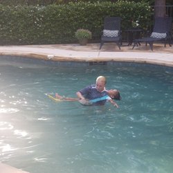 Miss Brencie’s Swim School - Daughter learning how to float