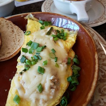 Another Broken Egg Cafe - The Floridian Omelette- has cream cheese, crab and other heavenly things - Breakfast & Brunch Near Me - Clearwater Beach, Florida
