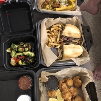 The Brass Tap - Prosper - Top to bottom: Korean BBQ pork nachos, steak sirloin sandwich and fries, Brussel sprouts, Dip 'Em Shrimp - Beer Bar Near Me - Prosper, Texas
