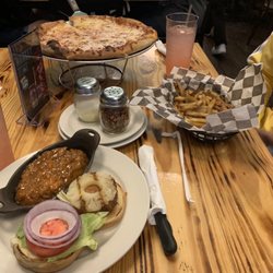 OLDE TOWNE Public House American Bistro - Crab cake sandwich (red onion and pineapple added) with sweet potatoes as a side. Cheese pizza , and fries