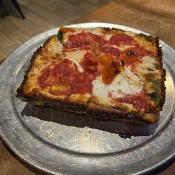 Taglio-Montgomery - Detroit style,  small spinach and ricotta pizza with cherry tomatoes added... very good! - Pizza Near Me - Cincinnati, Ohio