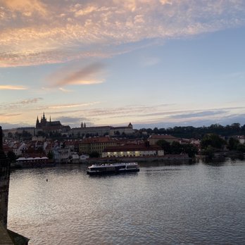 Pražský hrad - Castle in the distance perched on a hill - Landmarks & Historical Buildings Near Me - Prague, Puerto Rico