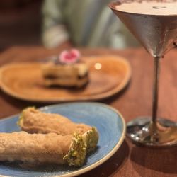 Pueo's Osteria - Yummy cannoli , tiramisu, and an espresso martini