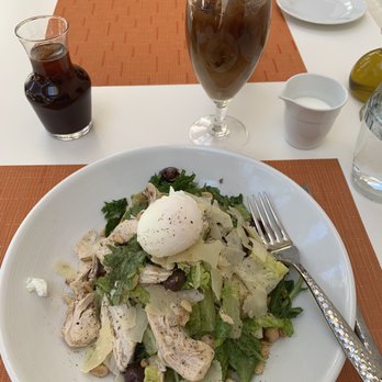 Veranda - Tuscan Kale Salad with chicken (added poached egg). - Breakfast & Brunch Near Me - Las Vegas, Nevada Veranda - Tuscan Kale Salad with chicken (added poached egg). - Breakfast & Brunch Near Me - Las Vegas, Nevada