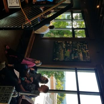 Sky High Brewery and Pub - This is Sky High brewing claiming the weather was bad and why they had their top balcony closed off. Perfect temperature with blue skies. - Breweries Near Me - Corvallis, Oregon