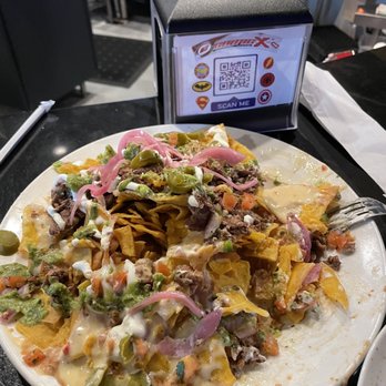 ComicX Restaurant Bar & Store - Rocket's Dirty Nachos - American Near Me - Phoenix, Arizona ComicX Restaurant Bar & Store - Rocket's Dirty Nachos - American Near Me - Phoenix, Arizona