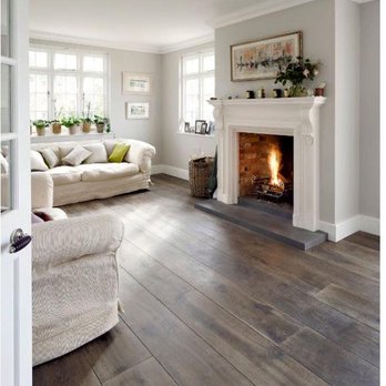 A&R Flooring Buford - a living room with a fireplace - Flooring Near Me - Buford, Georgia