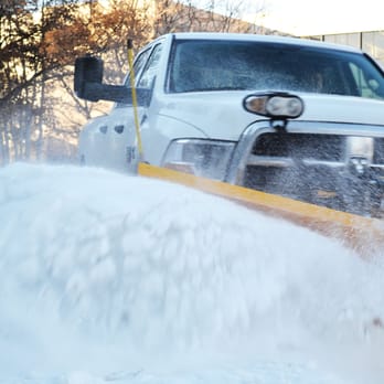 Solomon Services - a snow plow clearing a street - Landscaping Near Me - Denver, Colorado Solomon Services - a snow plow clearing a street - Landscaping Near Me - Denver, Colorado