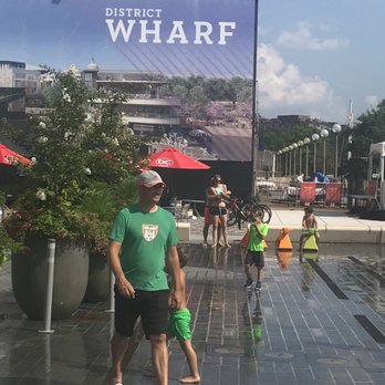 The Wharf DC - There's a fountain that children & adults alike play in to stay cool. Today's (8/5) temperature was 92. - Landmarks & Historical Buildings Near Me - Washington, DC, District of Columbia The Wharf DC - There's a fountain that children & adults alike play in to stay cool. Today's (8/5) temperature was 92. - Landmarks & Historical Buildings Near Me - Washington, DC, District of Columbia