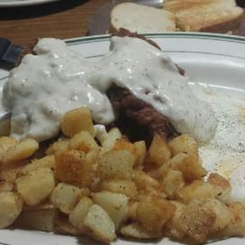 Lumberjacks Restaurant - Deep Fried Pork Loin and eggs with country potatoes and a side of sourdough toast. - American Near Me - Stockton, California Lumberjacks Restaurant - Deep Fried Pork Loin and eggs with country potatoes and a side of sourdough toast. - American Near Me - Stockton, California