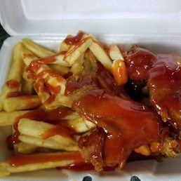 Banging fried chicken with bbq, hot sauce and ketchup it can be messy but it's damn good.