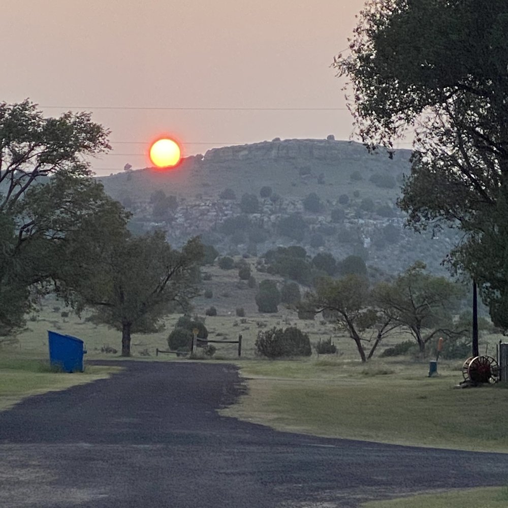 Hitching Post Lodging - Sunset from cabin in Kenton - Horseback Riding Near Me - Kenton, Oklahoma
