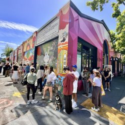 Clarion Alley - big line for pop-up $40 MUNI SLUT baseball hats