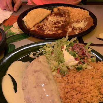 La Fiesta Mexican - two plates of food on a table - Mexican Near Me - Tarboro, North Carolina La Fiesta Mexican - two plates of food on a table - Mexican Near Me - Tarboro, North Carolina