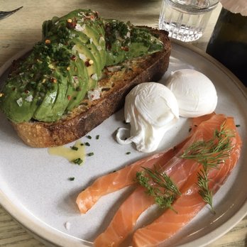 Crispin - Avocado on sourdough with poached eggs + salmon added - Breakfast & Brunch Near Me - London, XGL