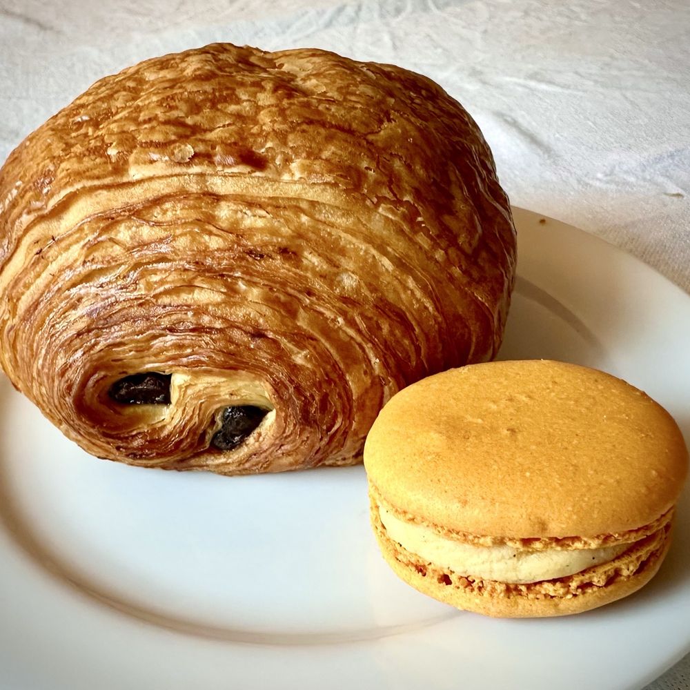 Petit Delice - My delicious croissant and passion fruit macaron. One macaron may have disappeared before the photograph was taken. - Sandwiches Near Me - Rockville, Maryland Petit Delice - My delicious croissant and passion fruit macaron. One macaron may have disappeared before the photograph was taken. - Sandwiches Near Me - Rockville, Maryland