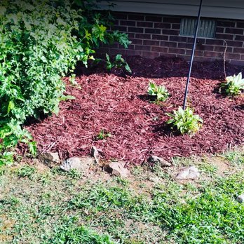 BTJ Lawn Care - a mulch bed in the yard - Lawn Services Near Me BTJ Lawn Care - a mulch bed in the yard - Lawn Services Near Me